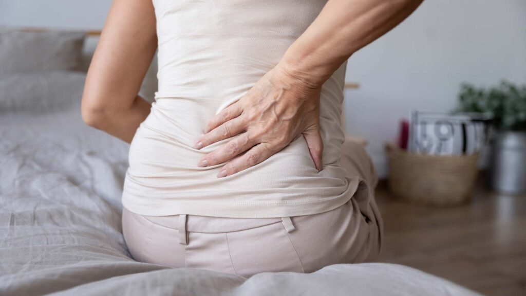 a patient struggling with lower back pain